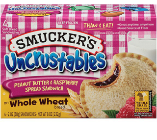 Smucker's® Uncrustables® Peanut Butter & Raspberry Spread Sandwich on Whole Wheat