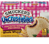 Smucker's® Uncrustables® Peanut Butter & Raspberry Spread Sandwich on Whole Wheat